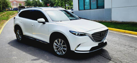 2017 Mazda CX-9 for sale at BOOST MOTORS LLC in Sterling VA