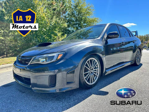 2013 Subaru Impreza for sale at LA 12 Motors in Durham NC