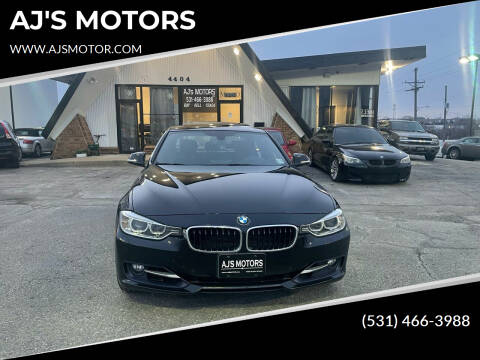 2015 BMW 3 Series for sale at AJ'S MOTORS in Omaha NE