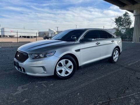 2015 Ford Taurus for sale at MT Motor Group LLC in Phoenix AZ