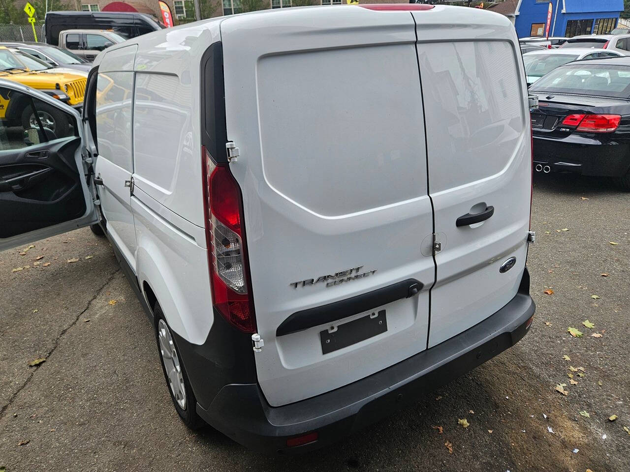 2017 Ford Transit Connect for sale at RENOS AUTO SALES LLC in Waterbury, CT