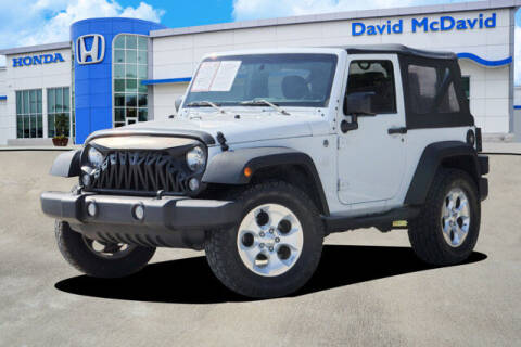 2015 Jeep Wrangler for sale at DAVID McDAVID HONDA OF IRVING in Irving TX