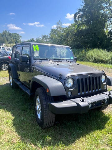 2014 Jeep Wrangler Unlimited for sale at Rinaldi Auto Sales Inc in Taylor PA