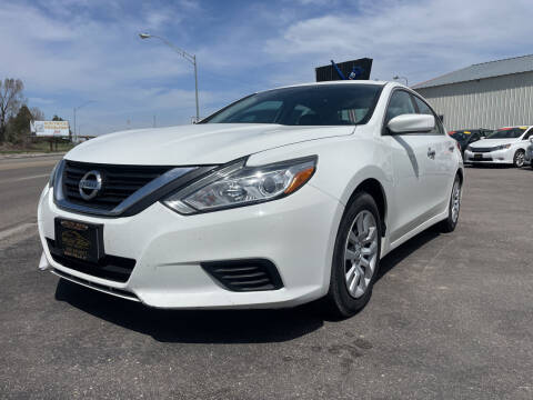 2016 Nissan Altima for sale at BELOW BOOK AUTO SALES in Idaho Falls ID