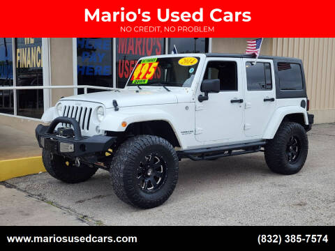 2014 Jeep Wrangler Unlimited for sale at Mario's Used Cars in Houston TX