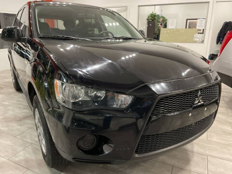 2010 Mitsubishi Outlander for sale at Evolution Autos in Whiteland IN