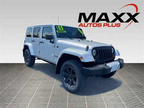 2012 Jeep Wrangler Unlimited for sale at Maxx Autos Plus in Puyallup WA