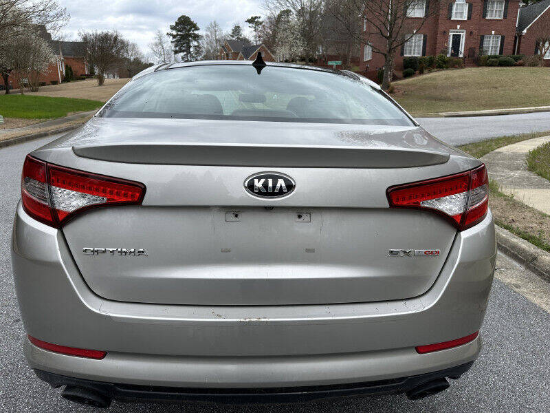 2013 Kia Optima for sale at SHURE AUTO SALES in Snellville, GA