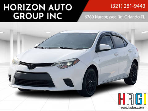 2014 Toyota Corolla for sale at Horizon Auto Group, Inc. in Orlando FL