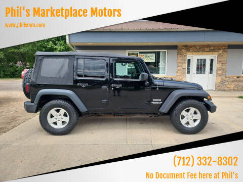 2017 Jeep Wrangler Unlimited for sale at Phil's Marketplace Motors in Arnolds Park IA