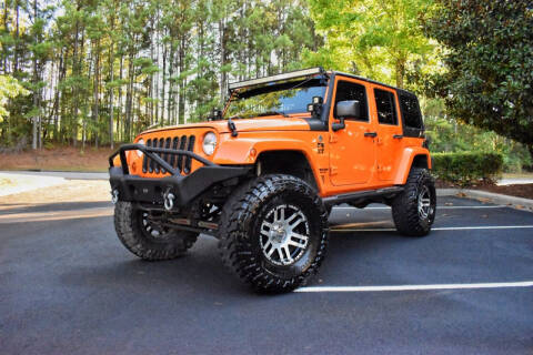 2012 Jeep Wrangler Unlimited for sale at Greystone Motors in Birmingham AL