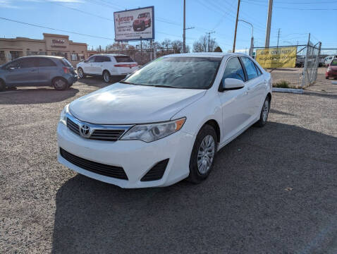 2013 Toyota Camry for sale at AUGE'S SALES AND SERVICE in Belen NM