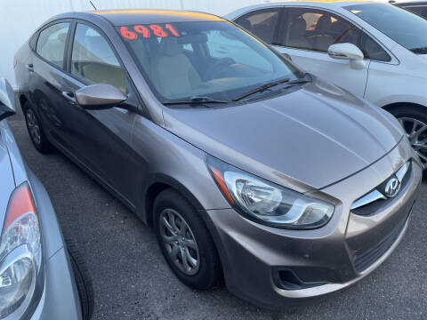 2013 Hyundai Accent for sale at BELOW BOOK AUTO SALES in Idaho Falls ID