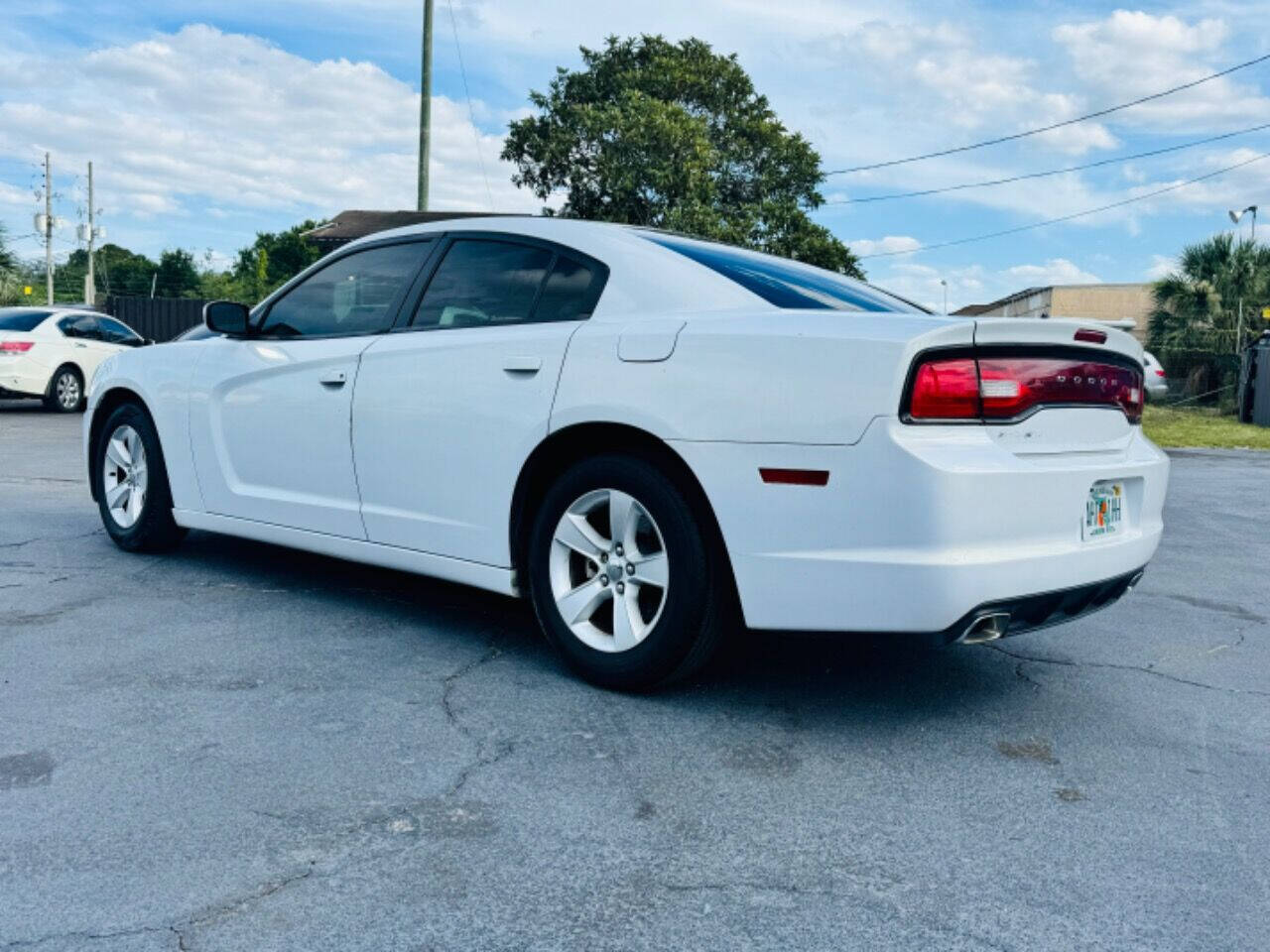 2014 Dodge Charger for sale at NOVA AUTO SALES in Orlando, FL