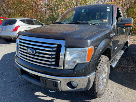 2011 Ford F-150 for sale at AUTO OUTLET in Taunton MA