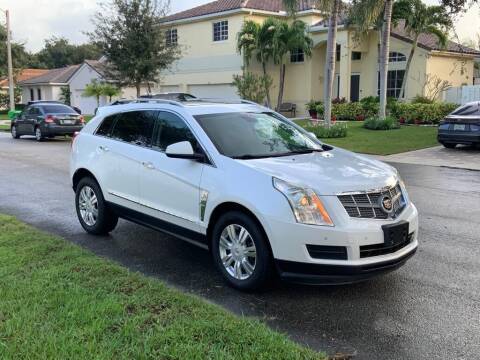 2011 Cadillac SRX for sale at UNITED AUTO BROKERS in Hollywood FL