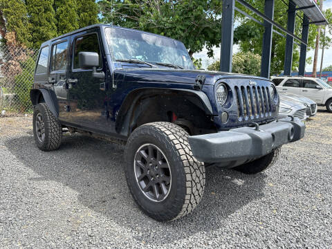 2013 Jeep Wrangler Unlimited for sale at Universal Auto Sales in Salem OR