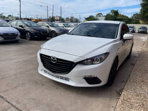 2014 Mazda MAZDA3 for sale at Sam's Auto Sales in Houston TX