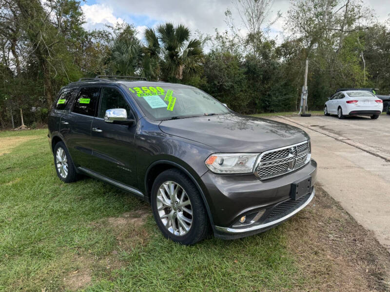 2014 Dodge Durango for sale at DION'S TRUCKS & CARS LLC in Alvin TX