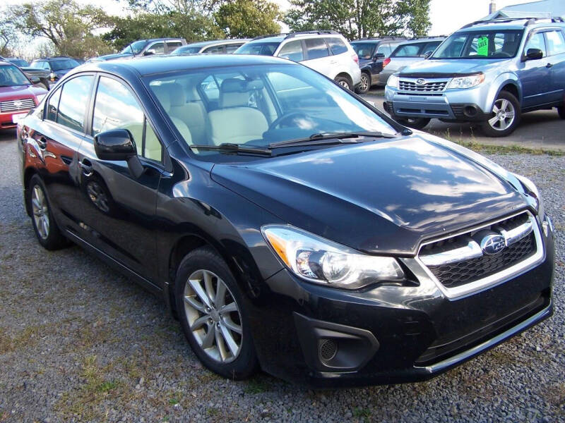 2012 Subaru Impreza for sale at B & J Auto Sales in Tunnelton WV