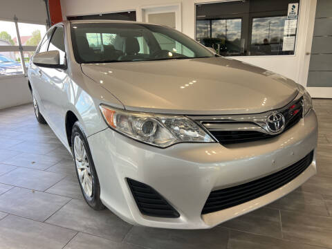 2012 Toyota Camry for sale at Evolution Autos in Whiteland IN