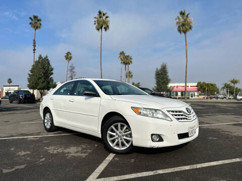 2011 Toyota Camry for sale at BARMAN AUTO INC in Bakersfield CA