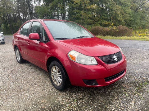 2012 Suzuki SX4 for sale at Pugh Boy's Auto Sales in Penn Run PA