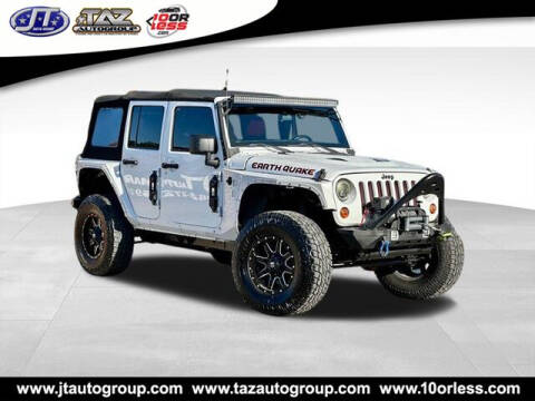 2016 Jeep Wrangler Unlimited for sale at J T Auto Group in Sanford NC