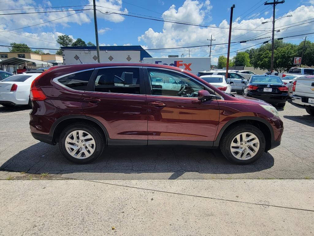 2016 Honda CR-V for sale at DAGO'S AUTO SALES LLC in Dalton, GA