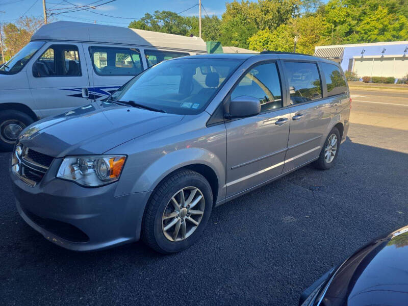 2013 Dodge Grand Caravan for sale at Maximum Auto Group II INC in Cortland OH