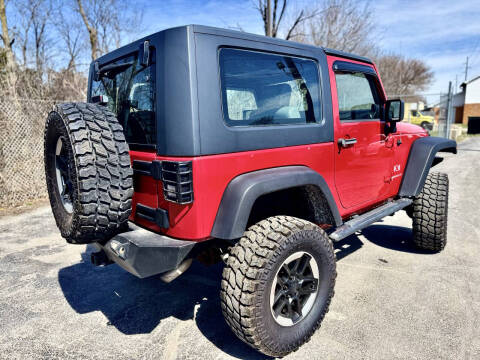 2009 Jeep Wrangler for sale at Purcell Auto Sales LLC in Camby IN