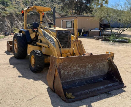 2006 John Deere 210LE