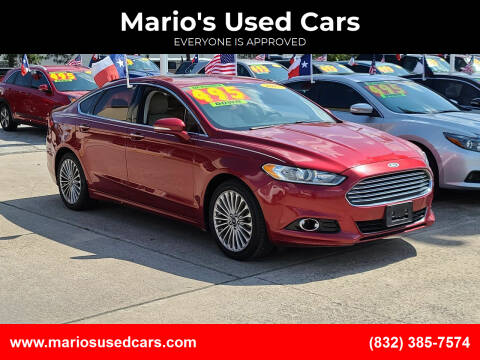 2015 Ford Fusion for sale at Mario's Used Cars in Houston TX