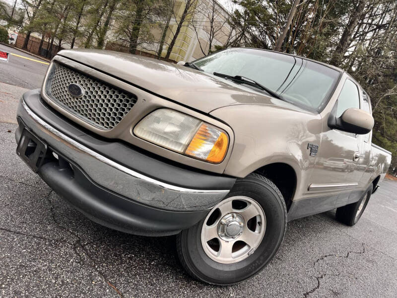 Used 2001 Ford F-150 XLT with VIN 1FTRX17W11NA90864 for sale in Roswell, GA