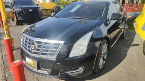 2014 Cadillac XTS for sale at Crown Auto Inc in South Gate CA