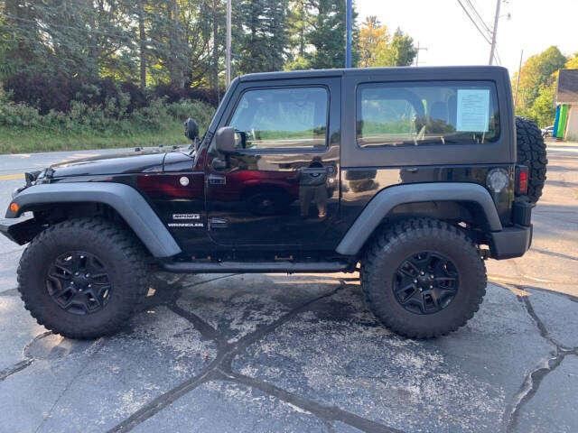 2014 Jeep Wrangler for sale at Chuckie Bizzarro's Fleetwing Auto in Erie, PA