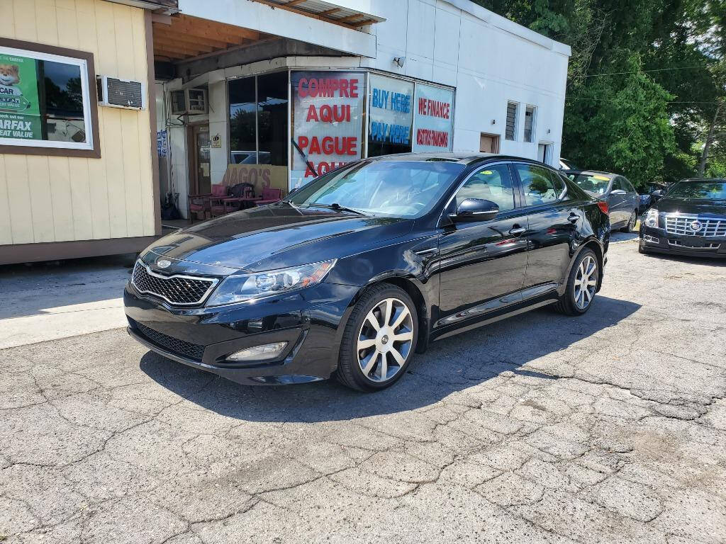 2012 Kia Optima for sale at DAGO'S AUTO SALES LLC in Dalton, GA