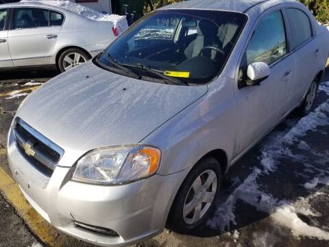 2011 Chevrolet Aveo for sale at Howe's Auto Sales in Lowell MA