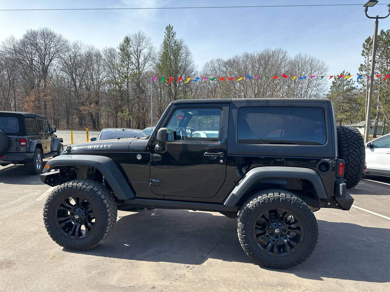 2015 Jeep Wrangler for sale at Auto Hunter in Webster, WI