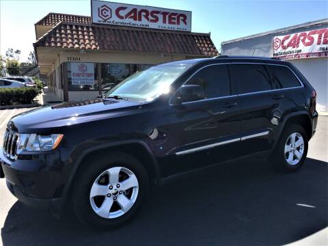 2011 Jeep Grand Cherokee for sale at CARSTER in Huntington Beach CA