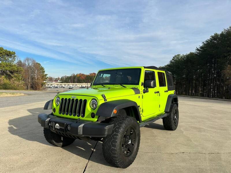 2013 Jeep Wrangler Unlimited for sale at Triple A's Motors in Greensboro NC
