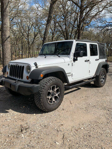 2012 Jeep Wrangler Unlimited for sale at BARROW MOTORS in Campbell TX