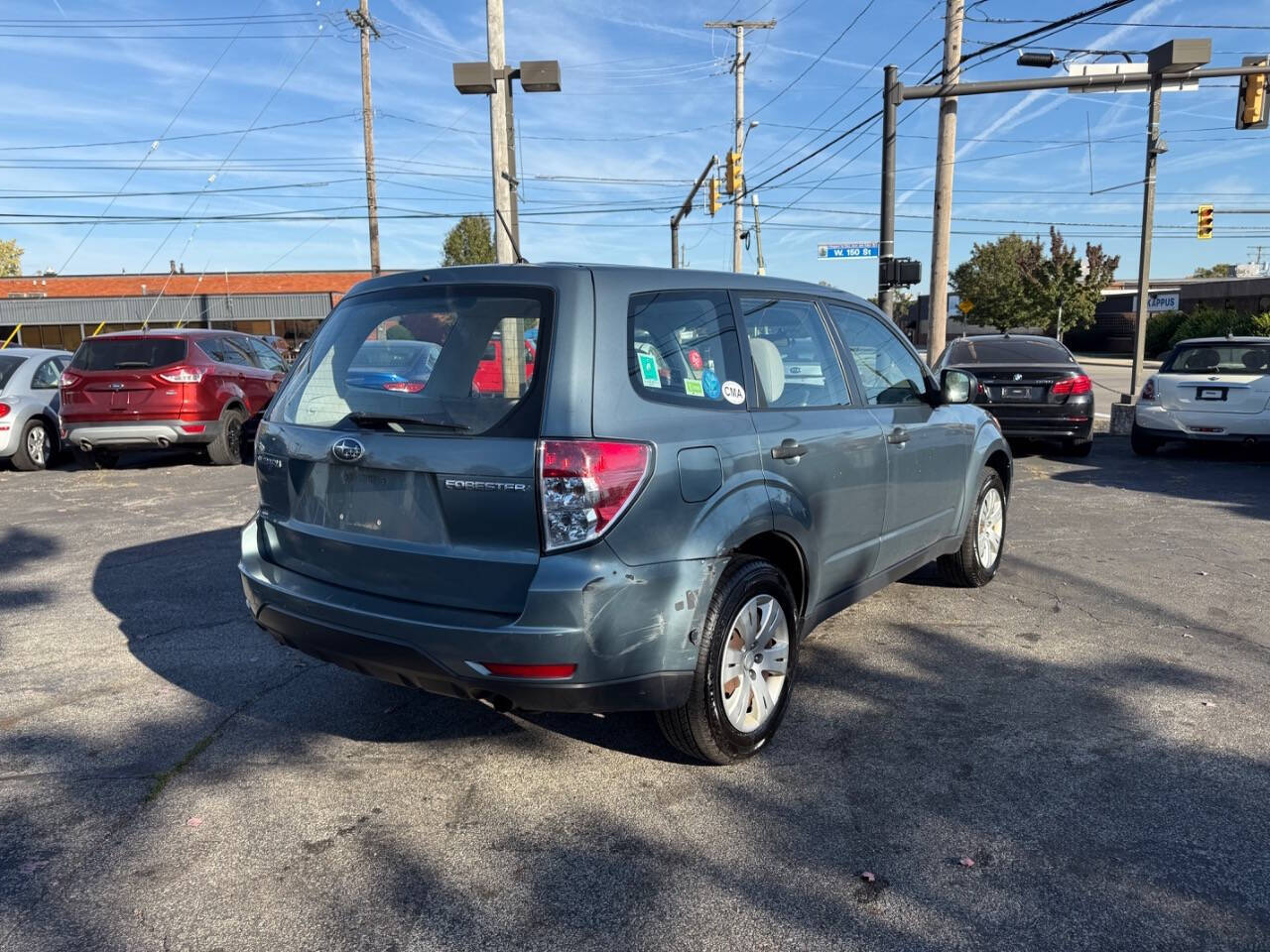 2009 Subaru Forester for sale at AVS AUTO GROUP LLC in CLEVELAND, OH