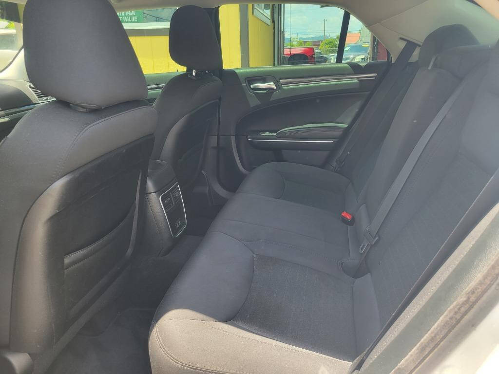 2018 Chrysler 300 for sale at DAGO'S AUTO SALES LLC in Dalton, GA