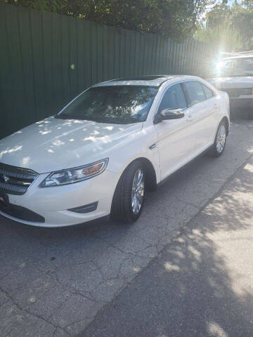 2010 Ford Taurus for sale at FIVE FRIENDS AUTO in Wilmington DE