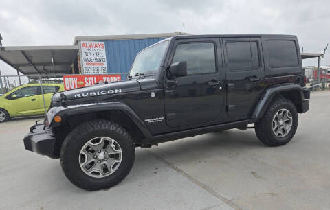 2013 Jeep Wrangler Unlimited for sale at ALWAYS MOTORS in Spring TX