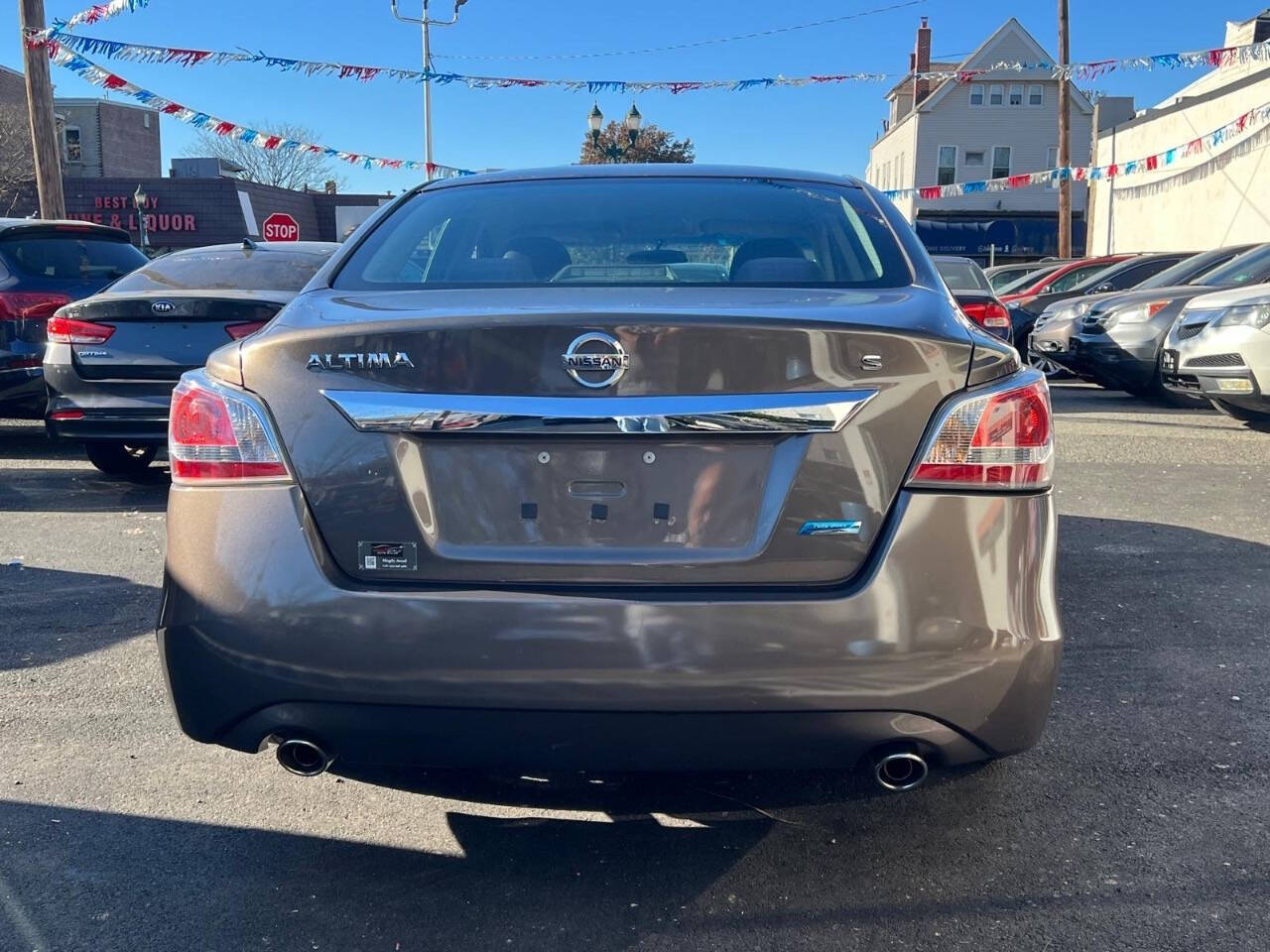 2014 Nissan Altima for sale at MBM Group LLC Auto Sales in Kearny, NJ