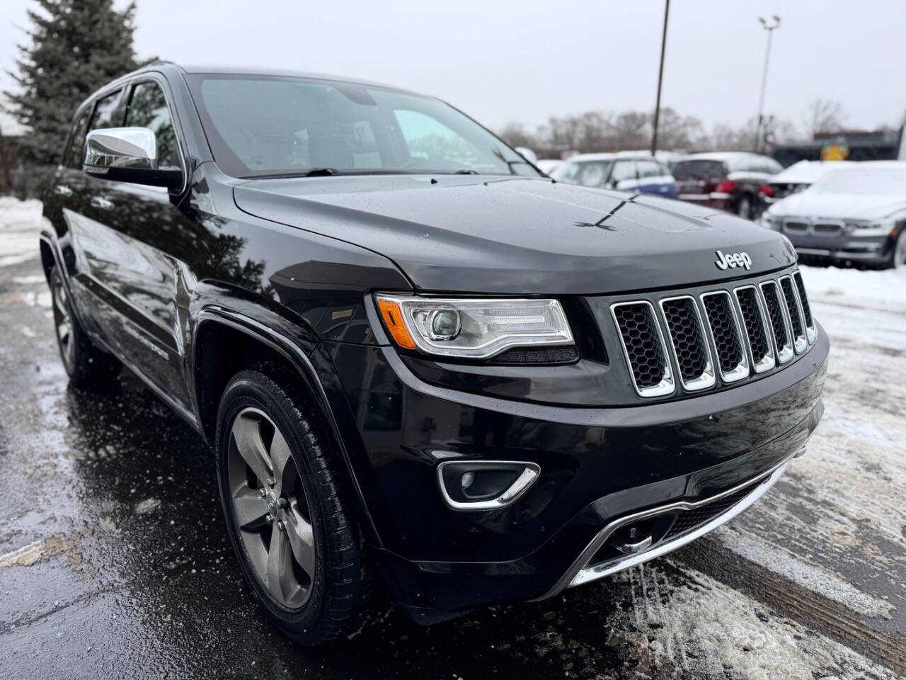 2015 Jeep Grand Cherokee for sale at Opus Motorcars in Utica, MI