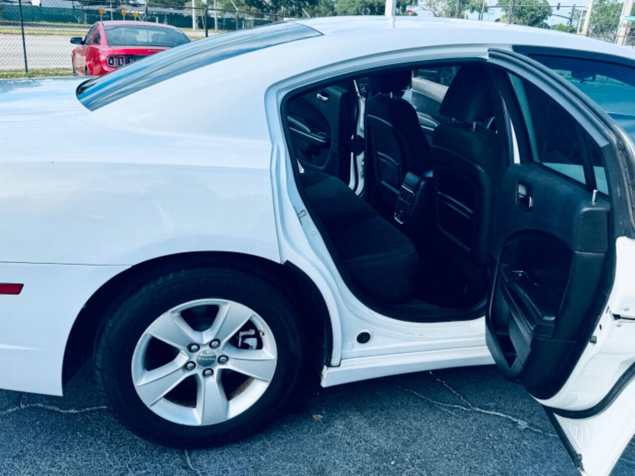 2014 Dodge Charger for sale at NOVA AUTO SALES in Orlando, FL