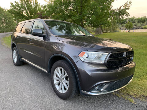 2014 Dodge Durango for sale at BELOW BOOK AUTO SALES in Idaho Falls ID
